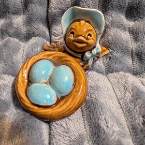 Ceramic salt and pepper shakers titled 'Blue Bonnet Bird & Nest